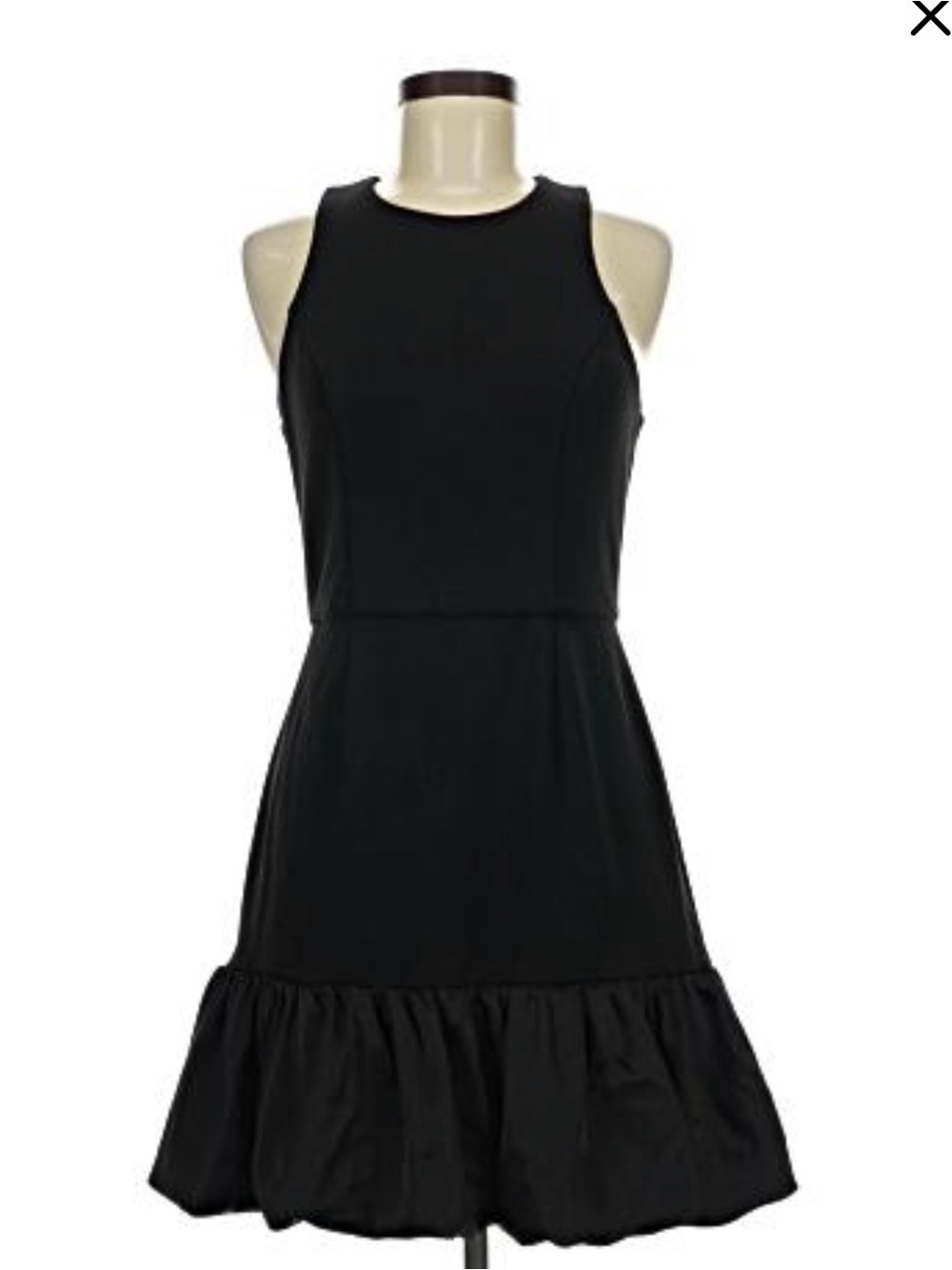 Black mini dress with ruffle hem